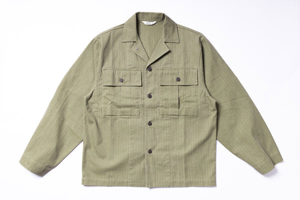 Green jacket with multiple pockets on a white background