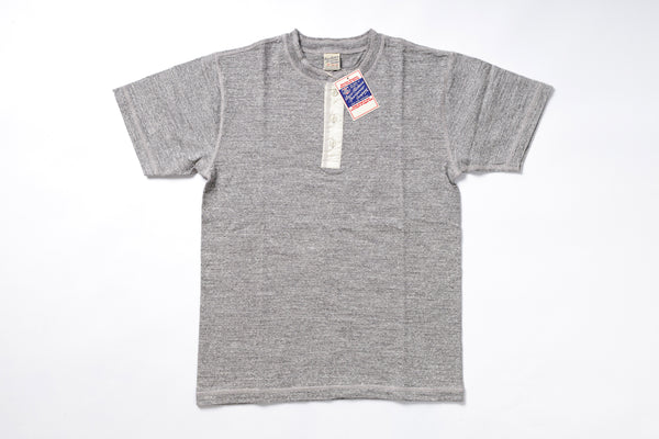 Gray t-shirt with a tag on a white background