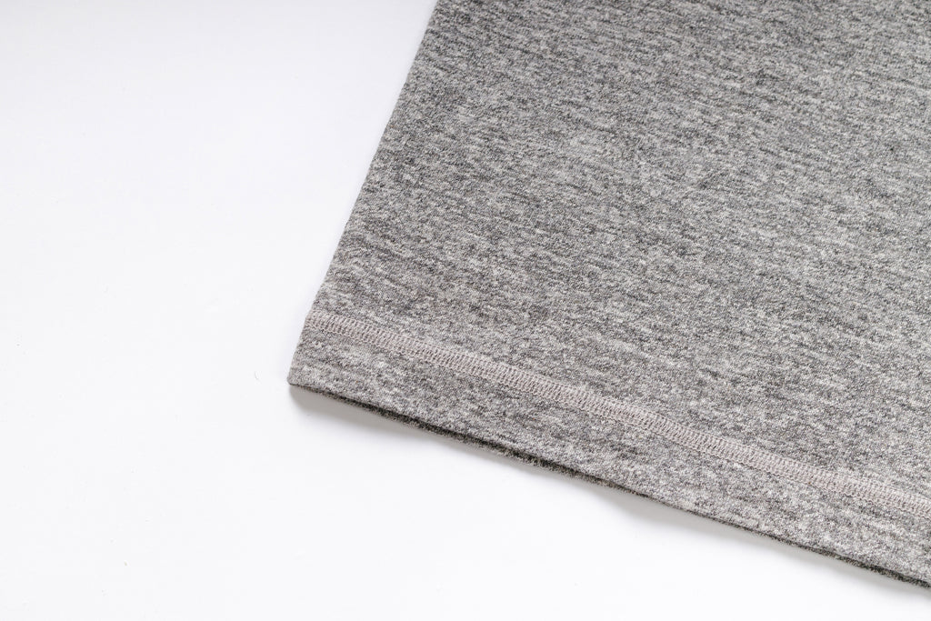 Close-up of gray fabric with a white background