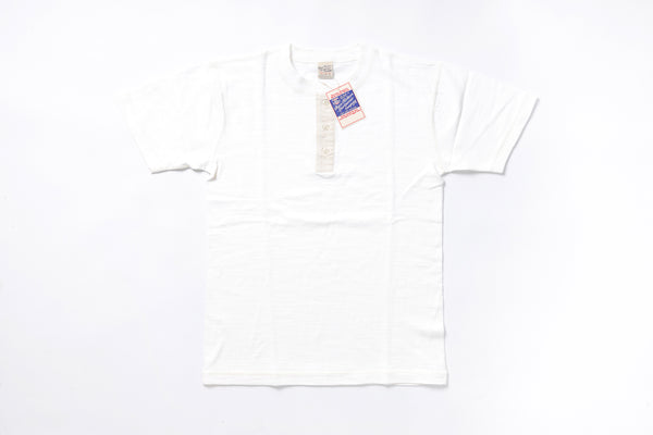 White t-shirt with a tag on a white background