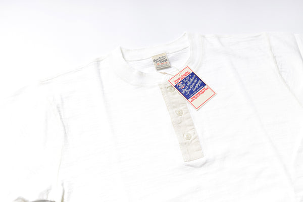 White shirt with a tag on a white background