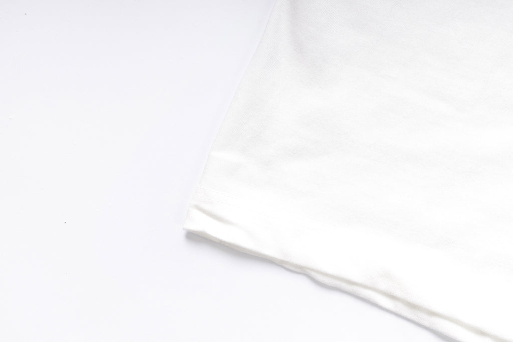 Thin white rod on a light gray background