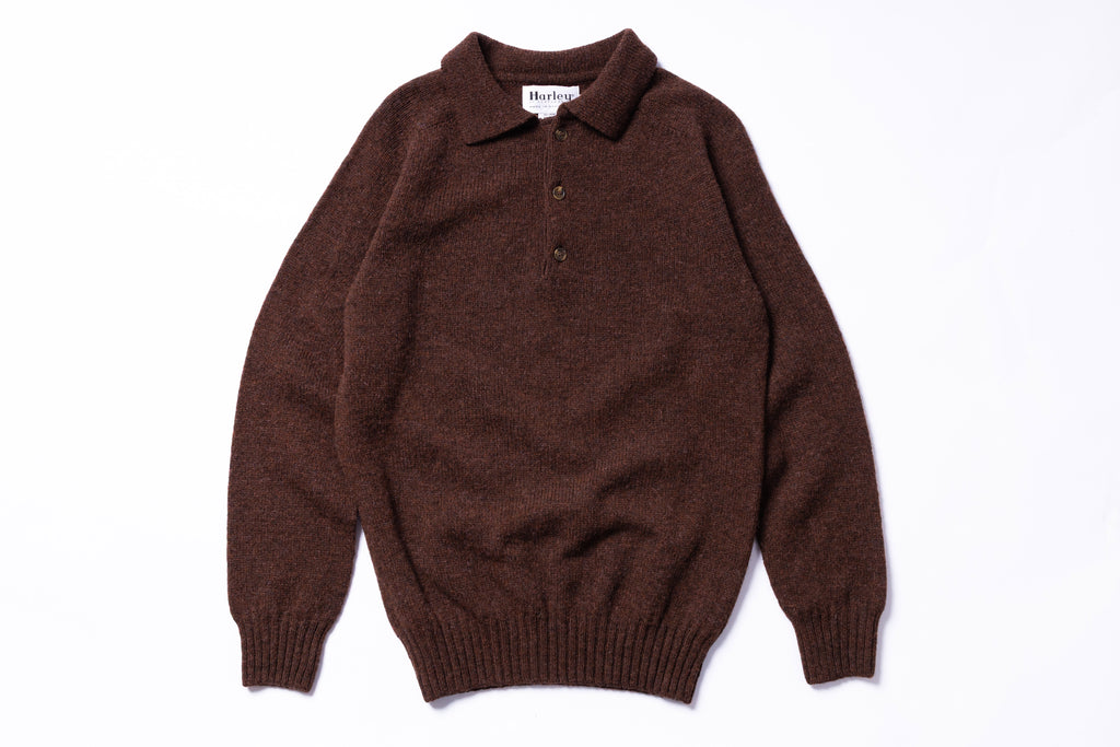 Brown knitted polo shirt on a white background