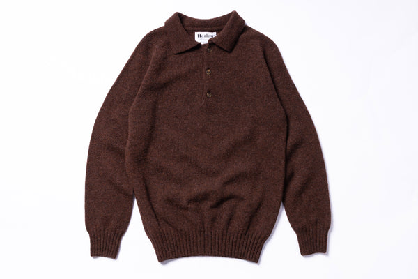Brown knitted polo shirt on a white background