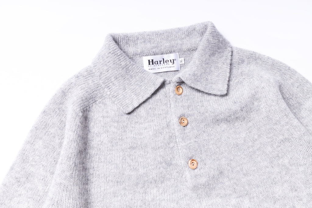 Gray polo shirt with Harley label on a white background