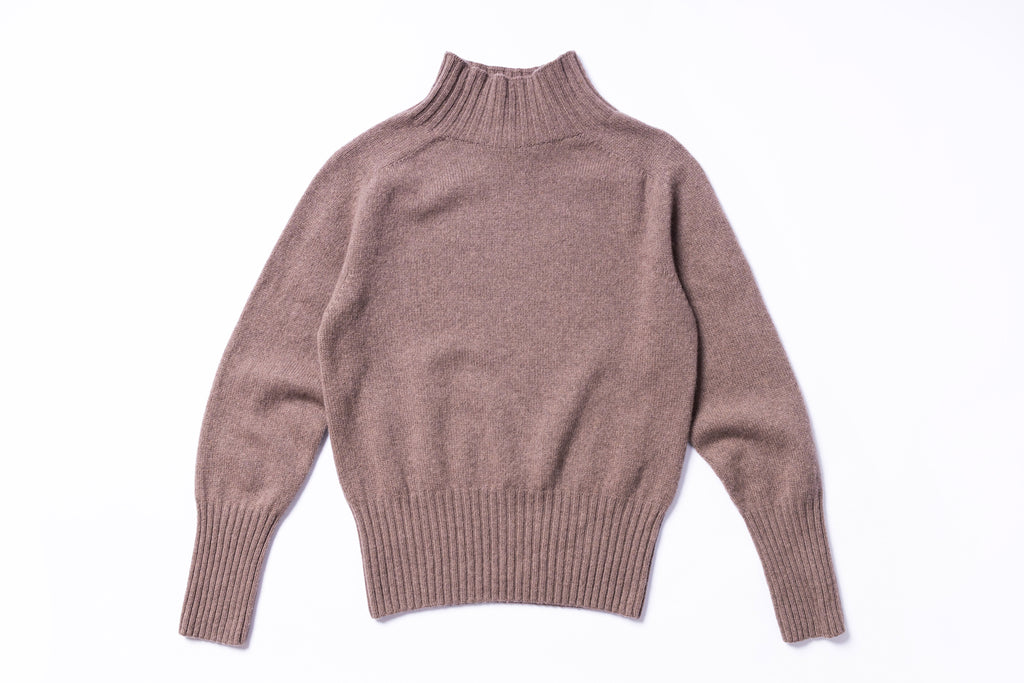 Brown sweater on a white background