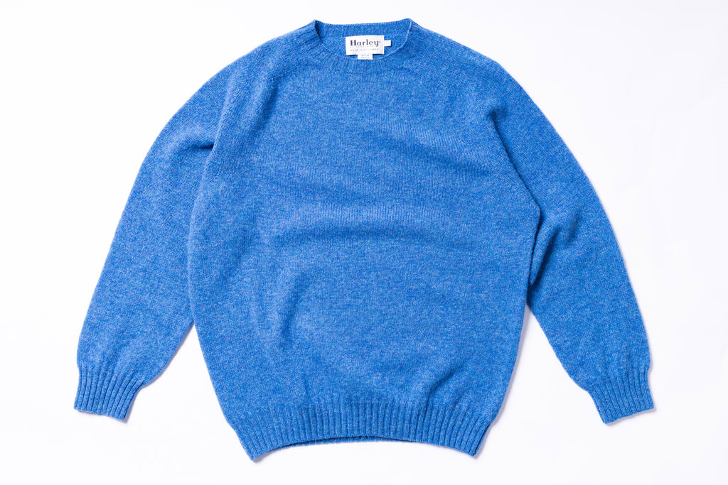 Blue sweater on a white background