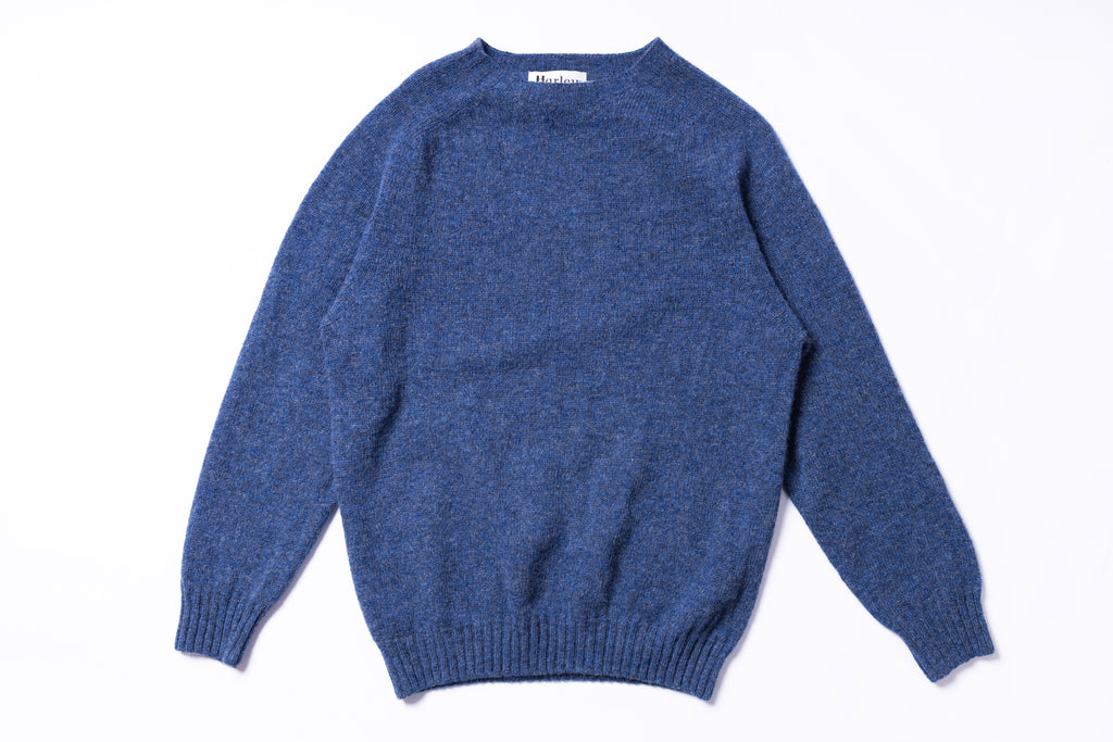 Blue sweater on a white background