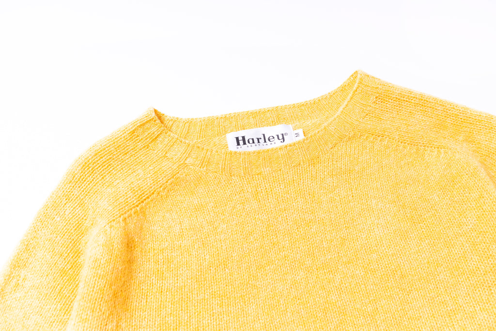 Yellow textured shirt with Harley logo on a white background