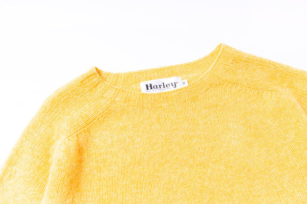 Yellow textured shirt with Harley logo on a white background