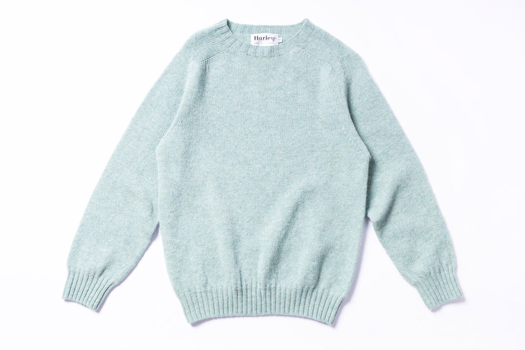 Light blue sweater on a white background