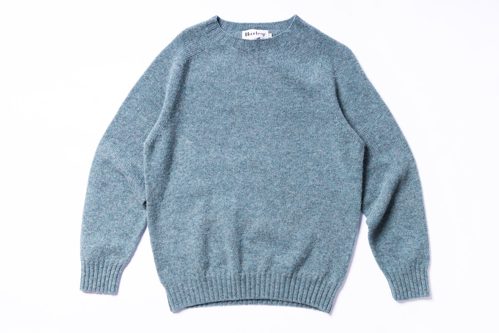 Blue sweater on a white background