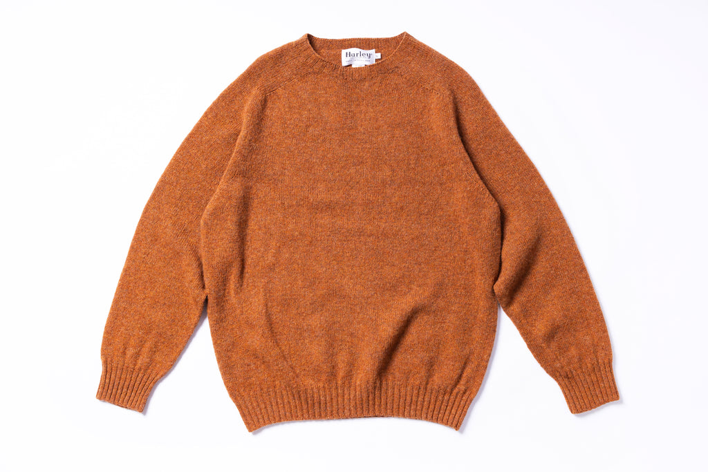 Brown sweater on a white background