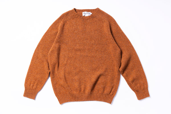 Brown sweater on a white background