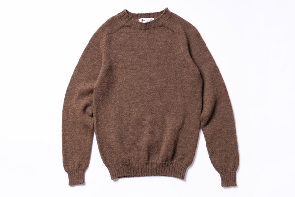 Brown sweater on a white background