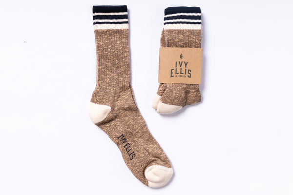 Pair of brown socks with striped cuffs on a white background, featuring the brand 'Ivy Ellis'.