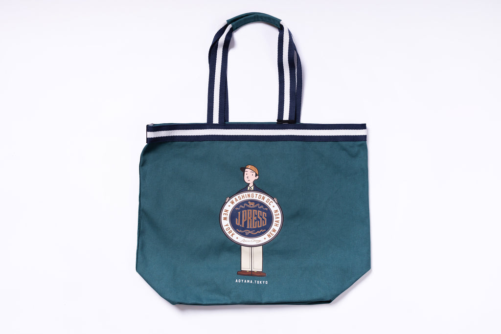 Green tote bag with a logo on a white background