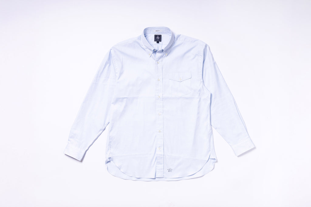 White button-up shirt on a white background