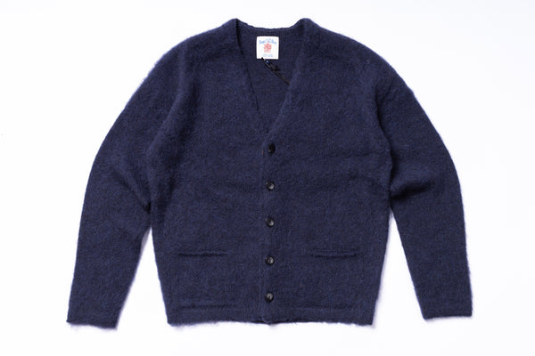 Navy blue cardigan on a white background