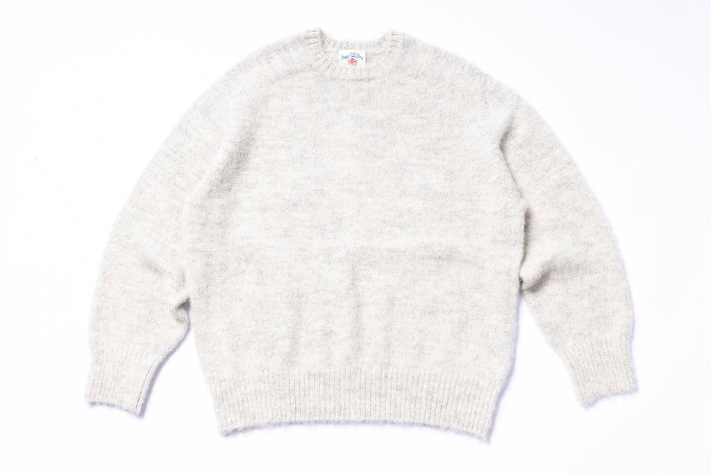 Light gray sweater on a white background