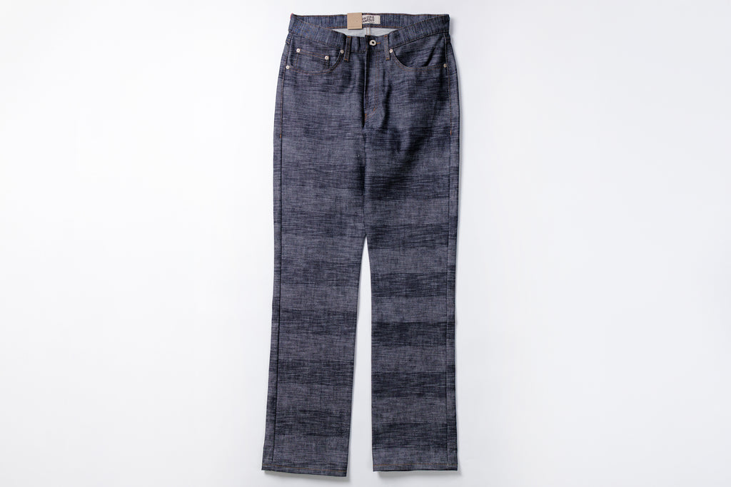 Pair of dark blue jeans on a white background