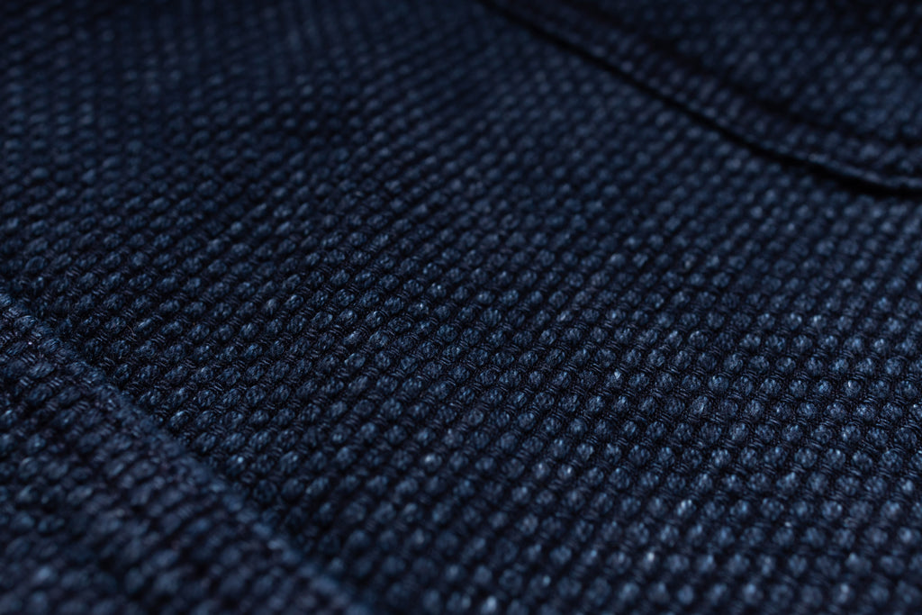 Close-up of dark blue fabric texture
