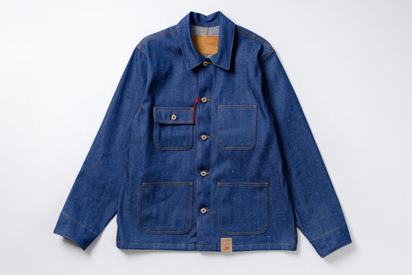 Blue denim jacket with multiple pockets on a white background