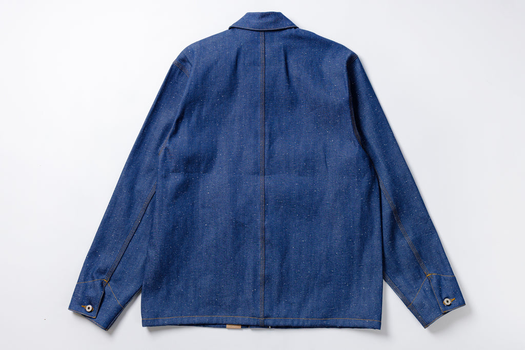 Blue denim jacket on a white background