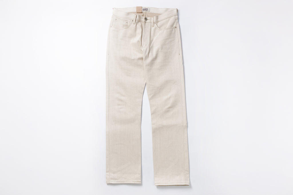 Ecru jeans on a white background