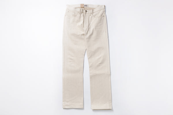 Ecru jeans on a white background