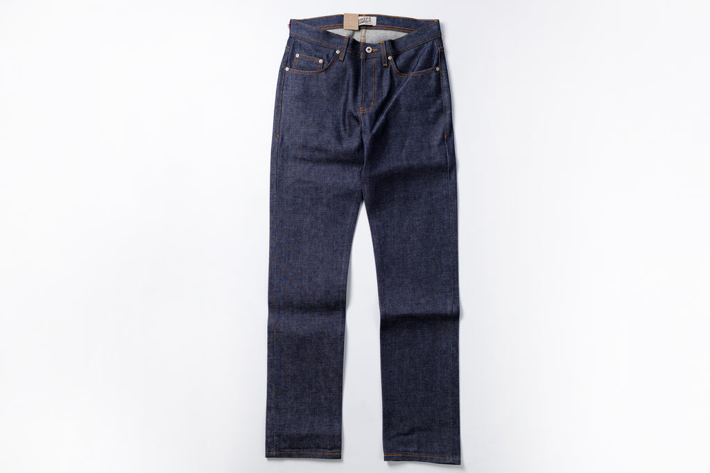 Pair of dark blue jeans on a white background