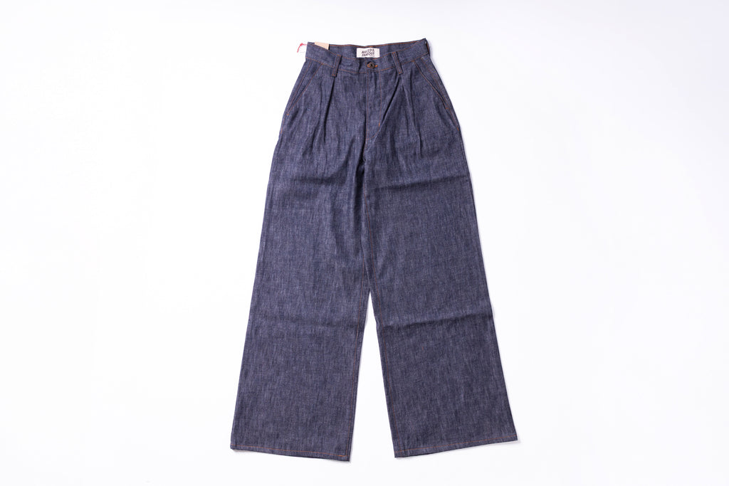 Pair of blue denim pants on a white background