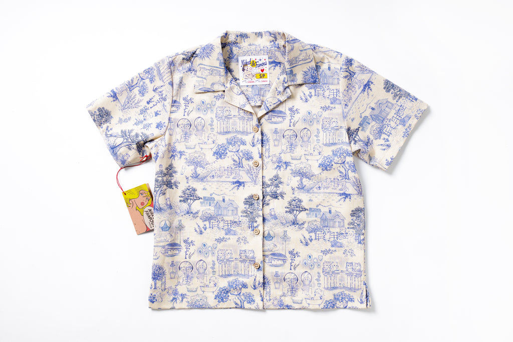 White shirt with blue floral pattern on a white background