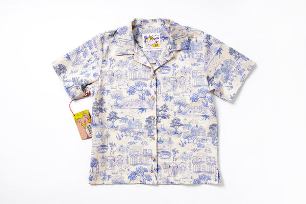 White shirt with blue floral pattern on a white background