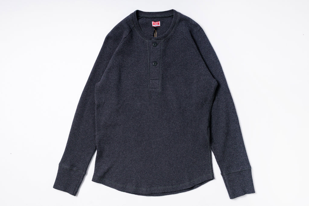 Dark gray long-sleeve shirt on a white background