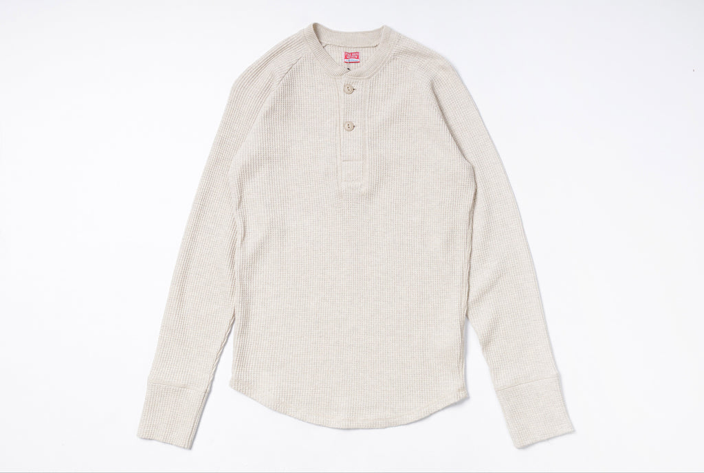 Beige long-sleeve shirt on a white background