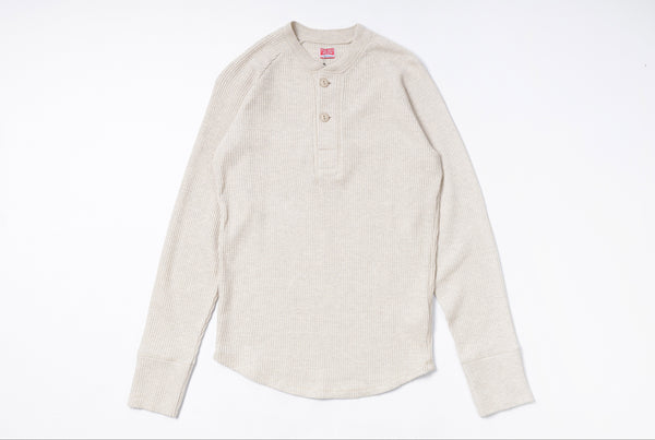 Beige long-sleeve shirt on a white background