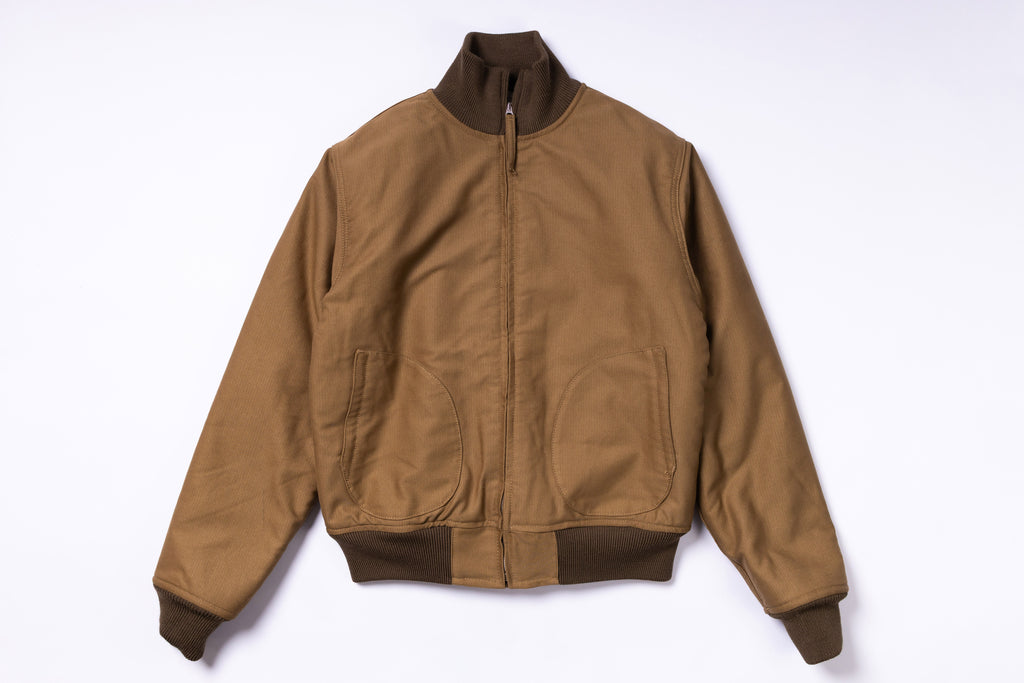 Brown jacket with dark brown collar and cuffs on a white background