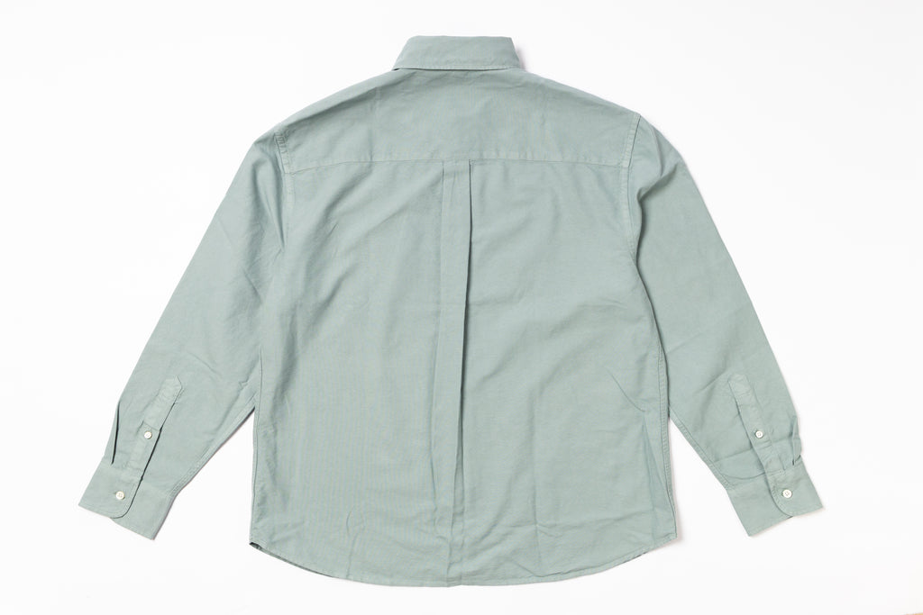 Light green shirt on a white background