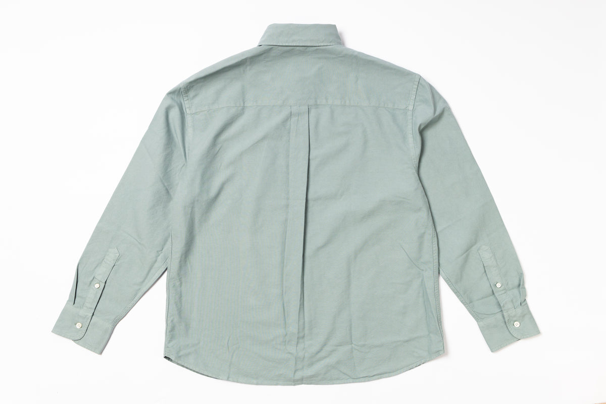 Light green shirt on a white background