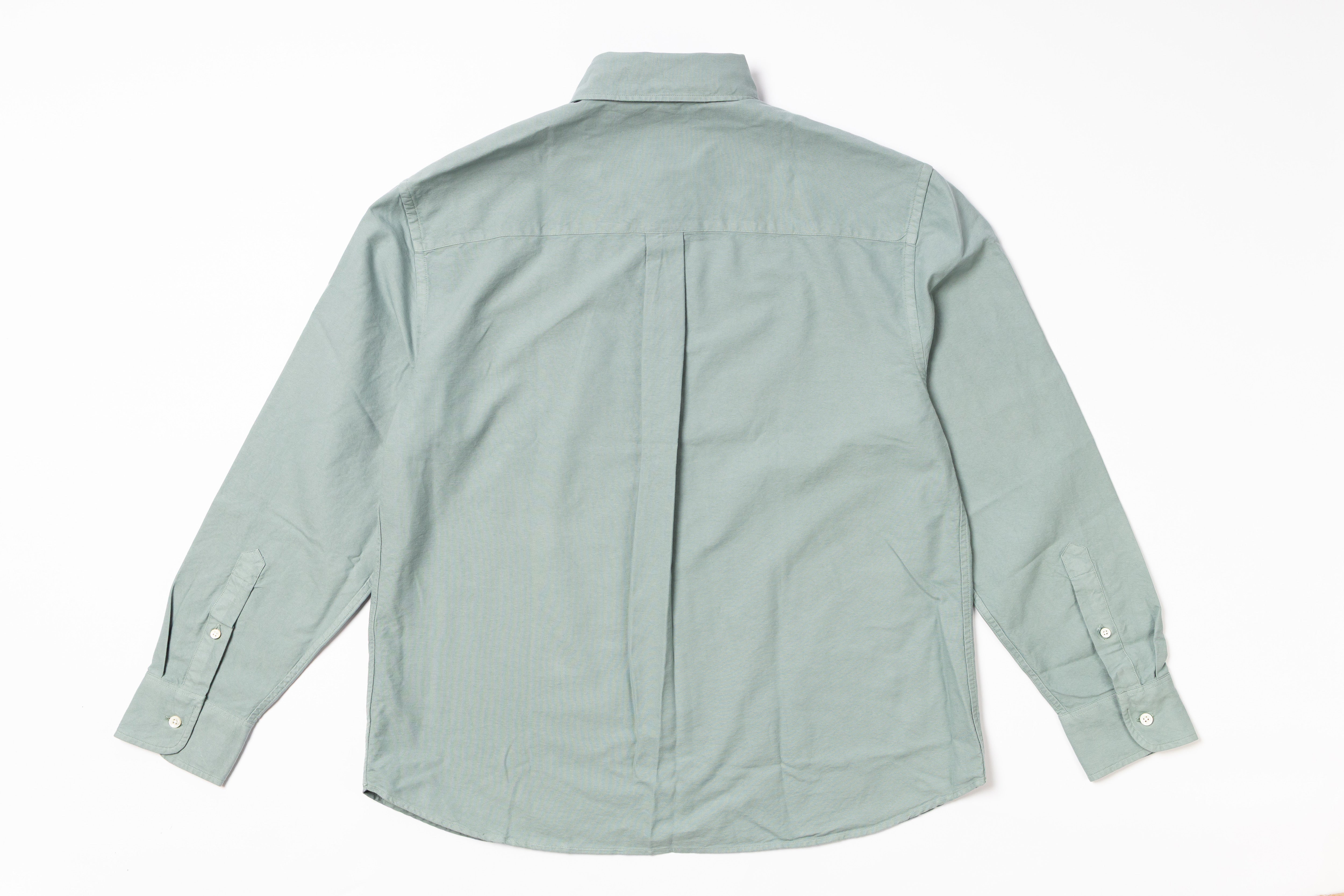 Light green shirt on a white background