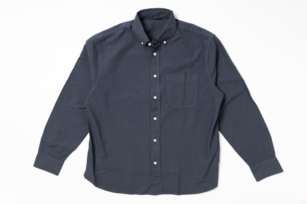 Dark gray button-up shirt on a white background