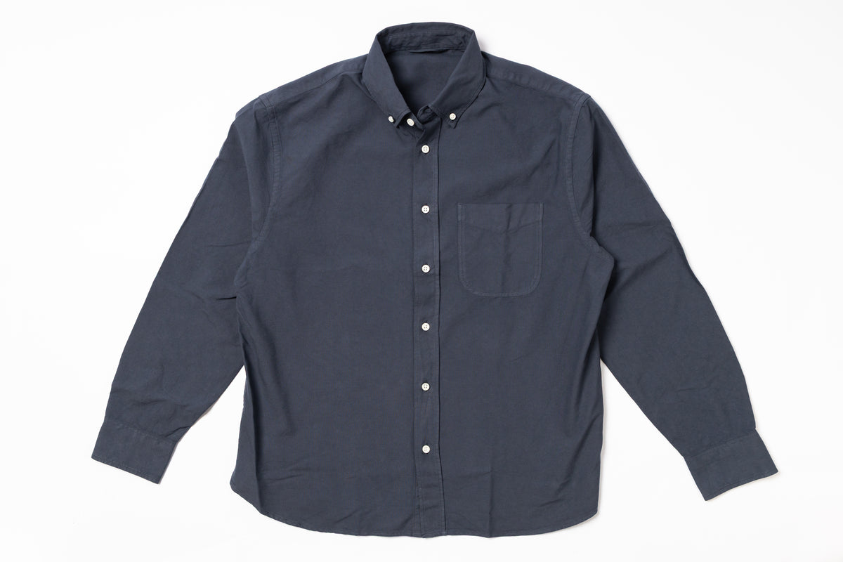 Dark gray button-up shirt on a white background