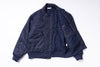 Navy blue bomber jacket on a white background