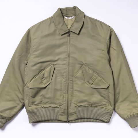 Green jacket with two front pockets on a white background