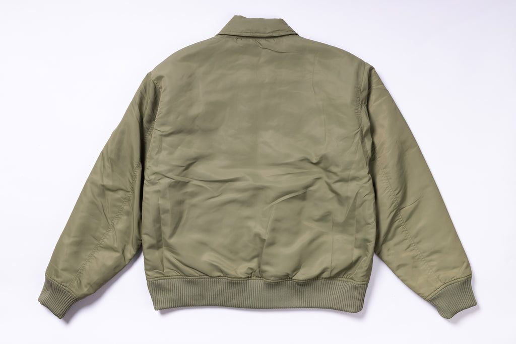 Green bomber jacket on a white background