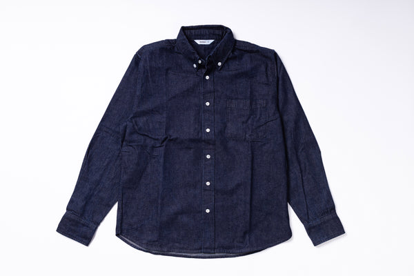 Navy blue button-up shirt on a white background