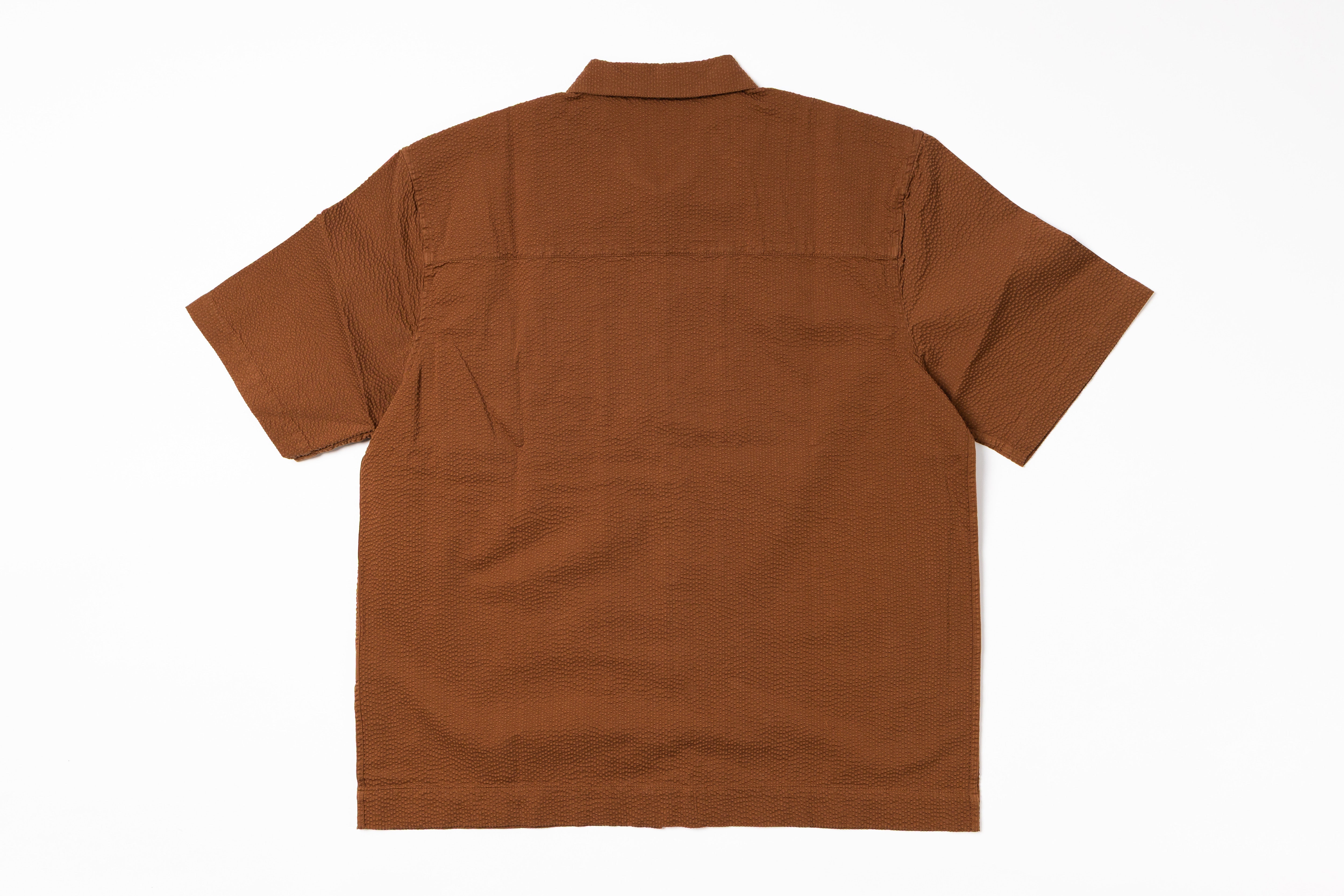 Brown shirt on a white background