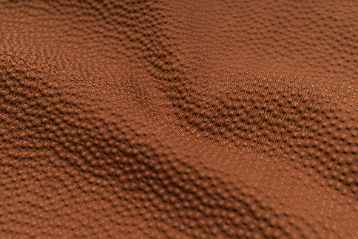 Close-up of brown textured fabric