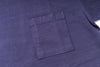 Close-up of a purple t-shirt with a pocket